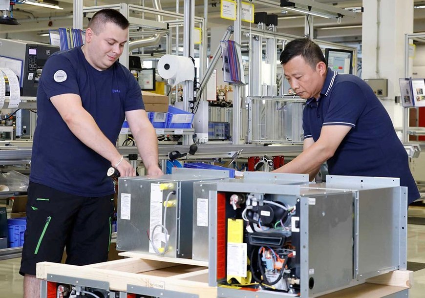 Truma employees at work in production 
