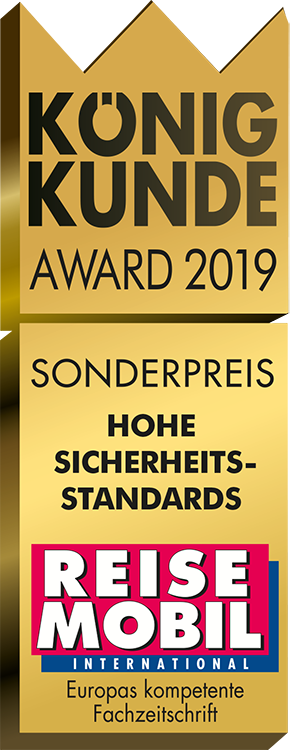 Eine goldgelbe Plakette mit der Aufschrift König Kunde Award 2019 Sonderpreis Hohe Sicherheitsstandards mit dem Logo von Reise Mobil International und dem Schriftzug Europas kompetente Fachzeitschrift am unteren Rand.