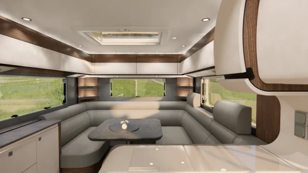 Ein modernes Wohnmobil-Interieur, inspiriert vom Carthago Liner for Two, mit einer L-förmigen Sitzgruppe in Beige und Grau, einem kleinen schwarzen Tisch mit einer einzelnen Vase, Holzakzenten, großen Fenstern und Deckenleuchten, die eine geräumige und helle Atmosphäre schaffen.